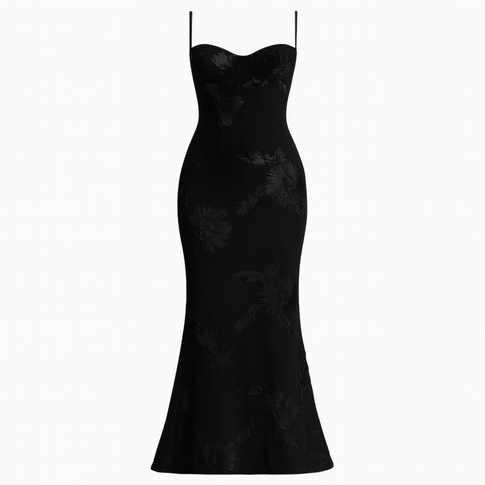 Black kouvr strapless dress on a white background