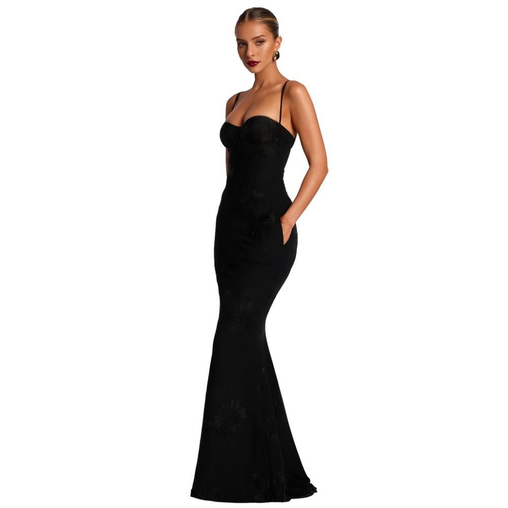 Black kouvr evening gown on a white background