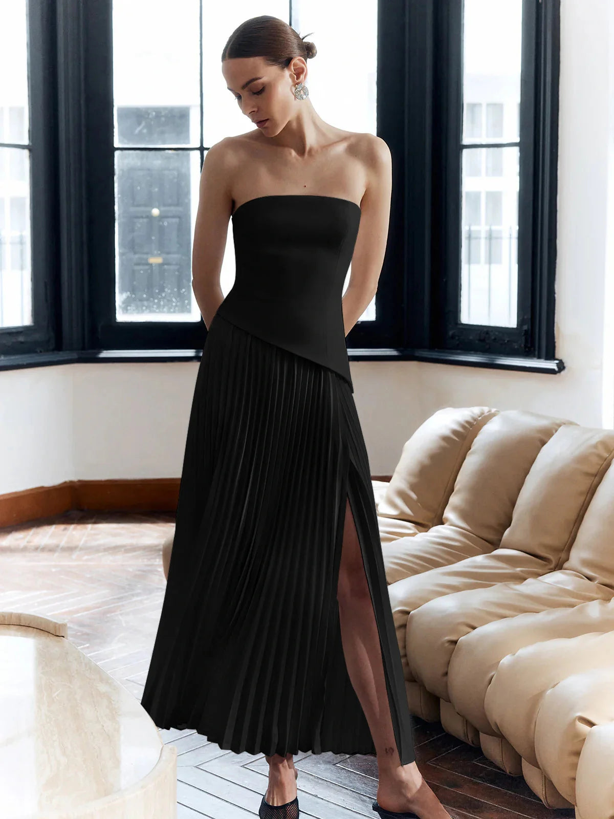 minimalist formal wear," "architectural gown," "bandeau top dress," "accordion pleat skirt," and "modern black-tie
