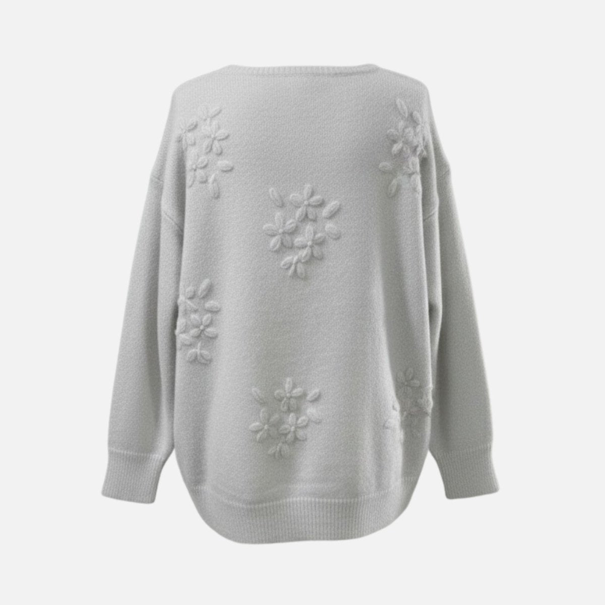Flatlay product shot of the back of the grey Blanche sweater, displaying the full scope of the 3D floral appliqués.