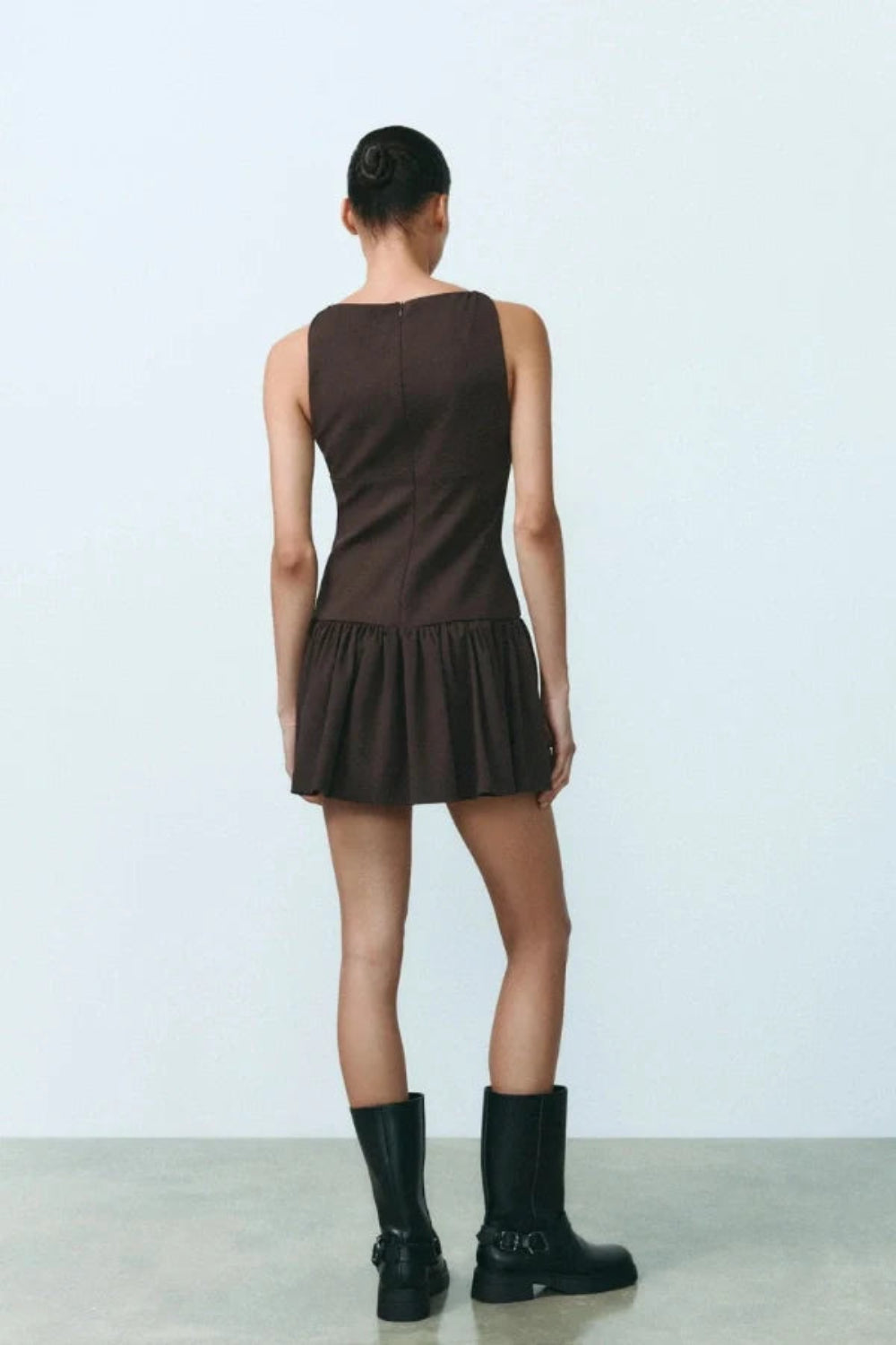 architectural silhouette', 'flared hem dress', 'quiet luxury aesthetic', 'minimalist party dress', 'boat neck dress', and 'day-to-night outfit