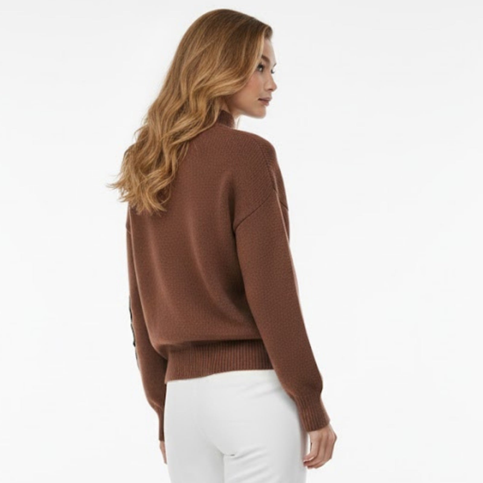 Back view of a model wearing the Kouvr Fashion brown sweater, highlighting the knit texture and relaxed silhouette.