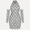 Model wearing the Kouvr Fashion silver crystal embellished sheer halter mini dress with matching long sleeves against a white background