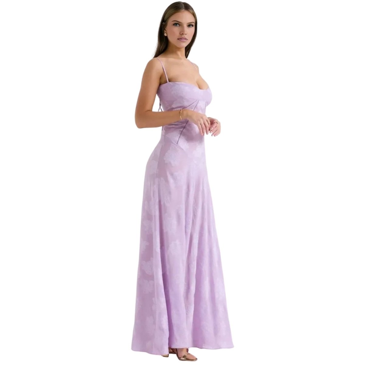 Woman wearing a long purple Kouvr dress on a white background