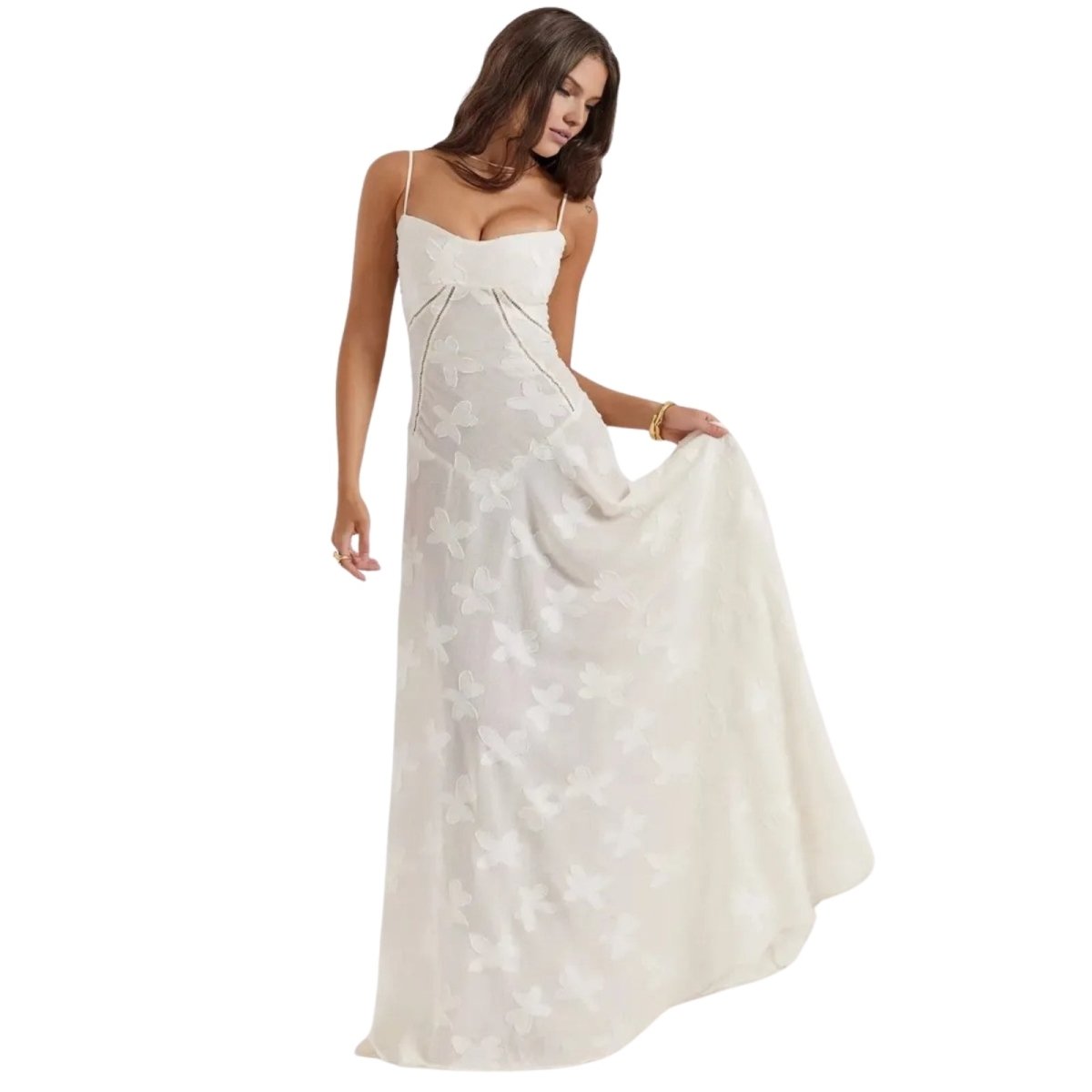 Woman wearing a white Kouvr floral dress on a white background