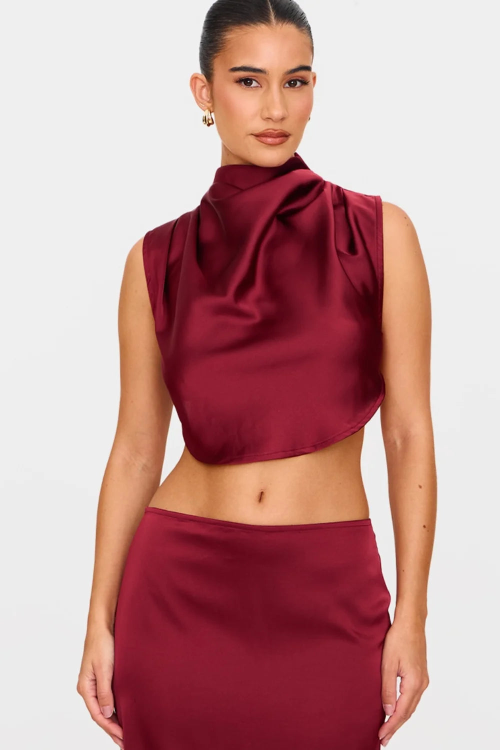 matching set," "eveningwear," "special occasion outfit," "minimalist formal," "bias-cut skirt," "sleeveless high-neck top," "wedding guest attire