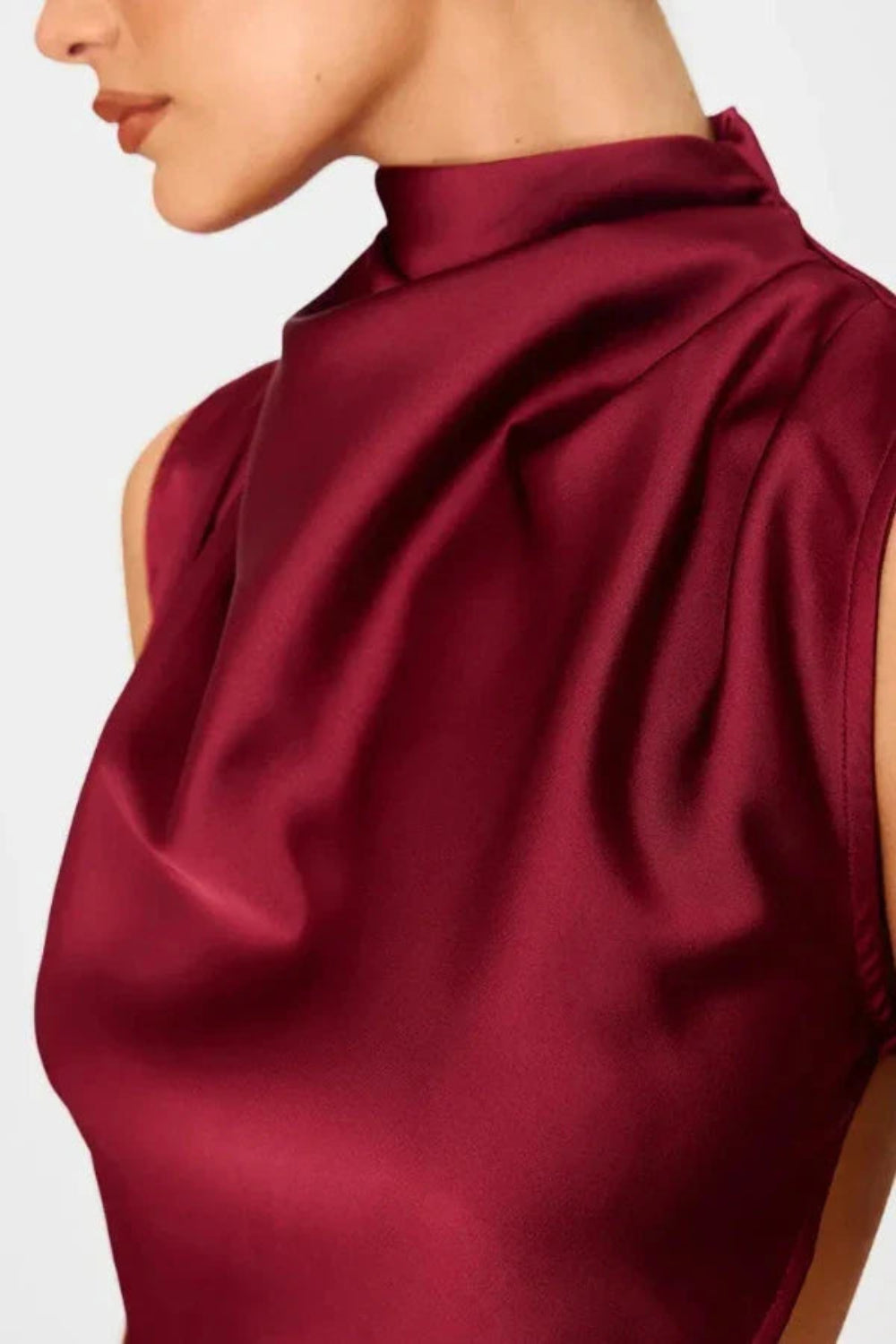 matching set," "eveningwear," "special occasion outfit," "minimalist formal," "bias-cut skirt," "sleeveless high-neck top," "wedding guest attire