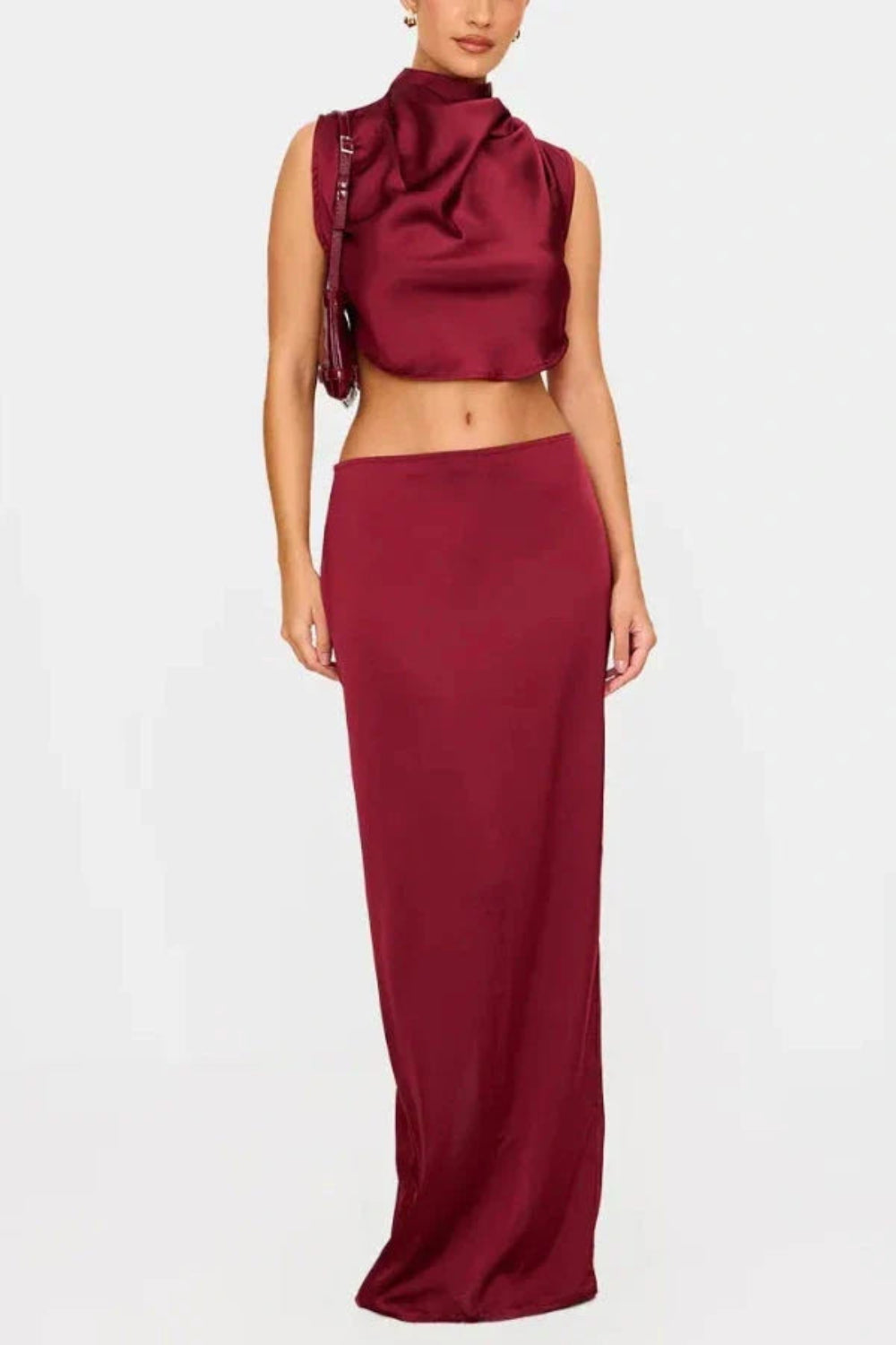 matching set," "eveningwear," "special occasion outfit," "minimalist formal," "bias-cut skirt," "sleeveless high-neck top," "wedding guest attire