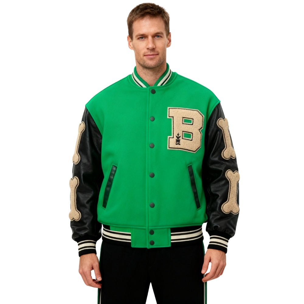 Man wearing a green and black Kouvr varsity jacket with a 'B' logo on a white background