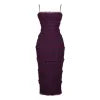 Model wearing the Kouvr Fashion Hannie formal evening jumpsuit in plum purple with tiered ruffles and bead embellishments