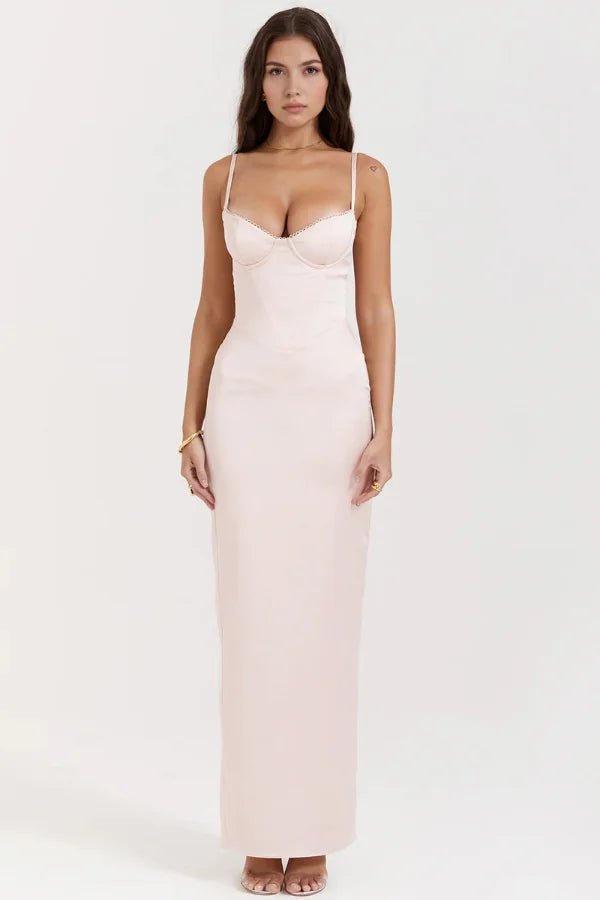 Model wearing the light pink Haven satin corset maxi gown by Kouvr Fashion, front view for color comparison.
