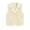 Kouvr Fashion women's ivory genuine leather vest with authentic fox fur collar" and "Interior view of the Kouvr Fashion vest showing the insulated quilted satin lining