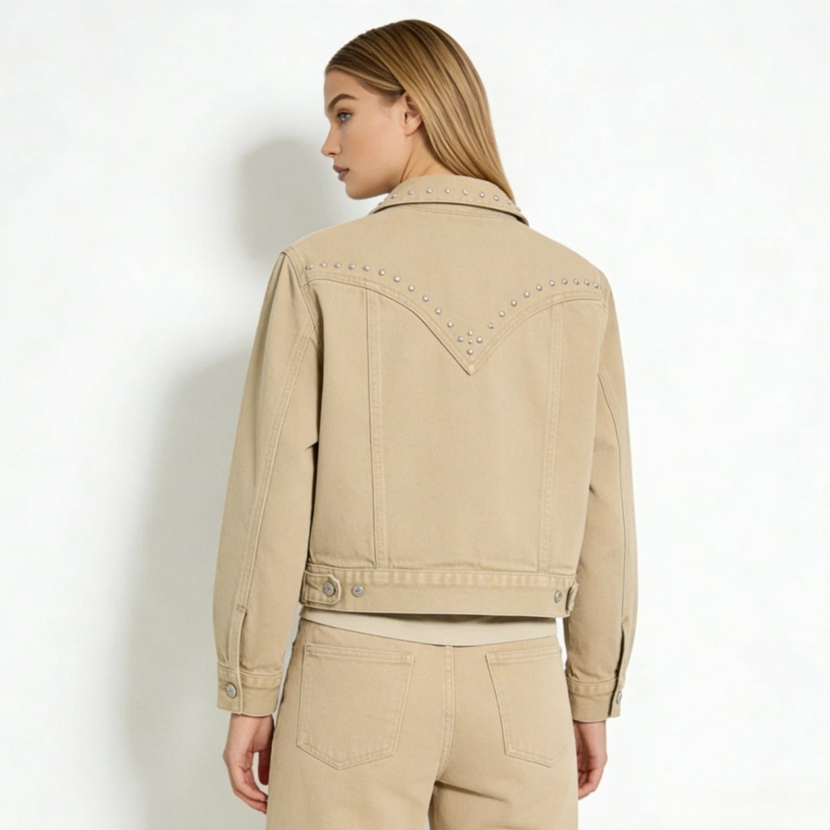 Back view of the Kouvr Fashion Jacklyn jacket in khaki, showcasing the western-inspired V-shaped yoke with silver stud embellishments.