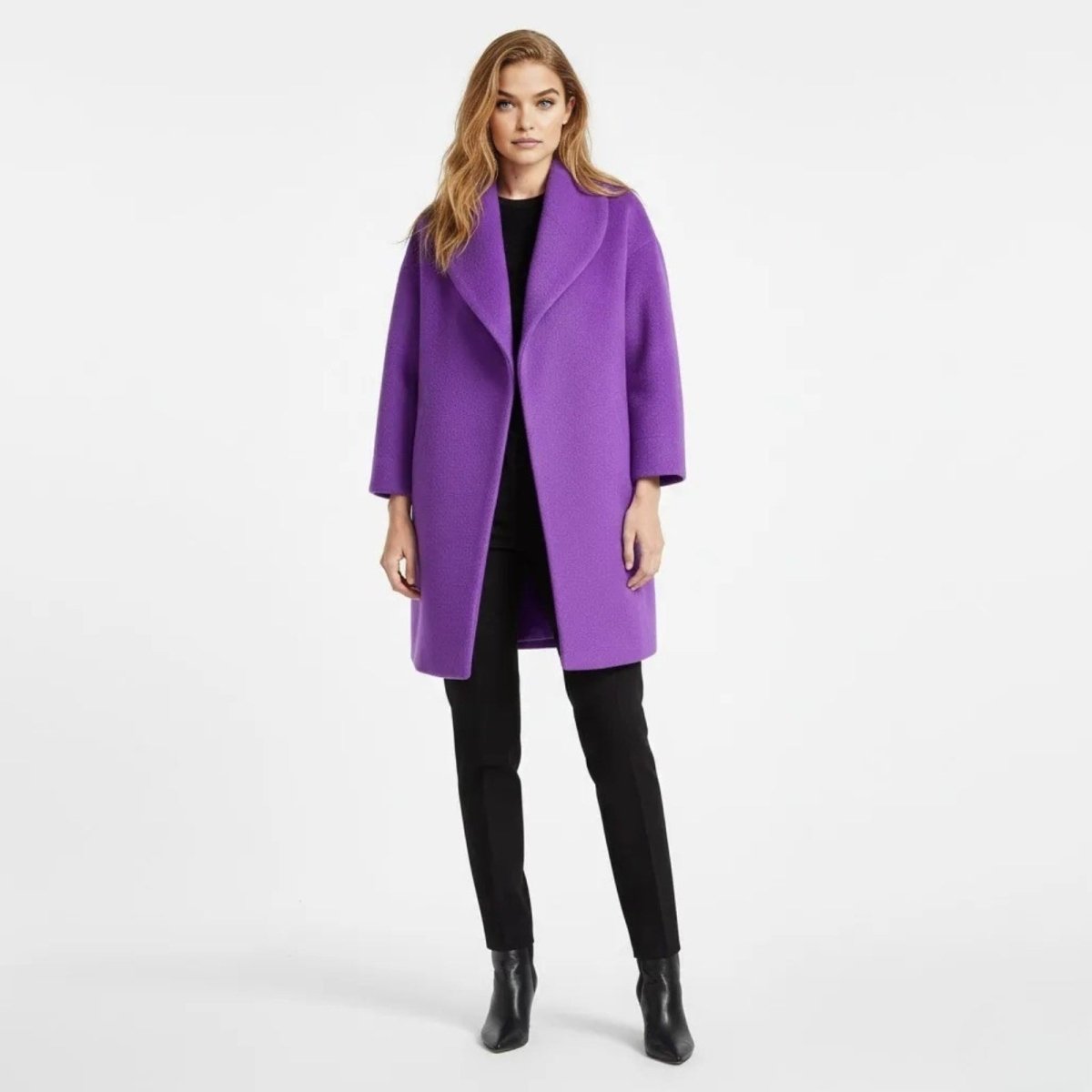 Model wearing the Kouvr Fashion oversized janice purple wool cocoon coat, styled with black trousers and ankle boots, showing the full front view.