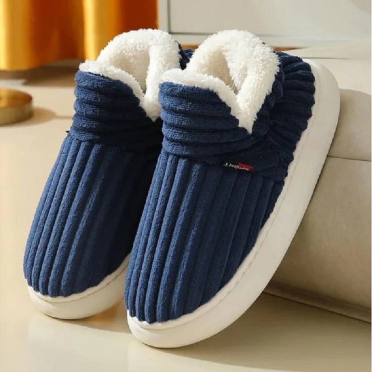 A pair of Blue Jasmine corduroy slipper boots by Kouvr Fashion, highlighting the wide-wale texture and plush sherpa collar.