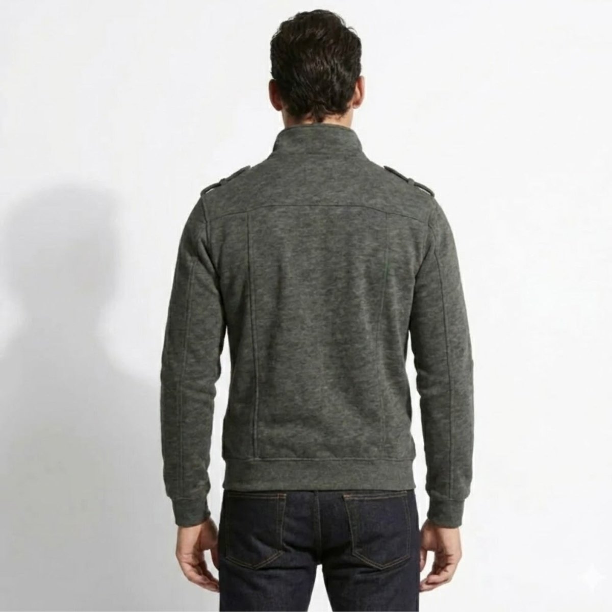 Back view of a model in the Kouvr Fashion Kent dark grey military jacket highlighting the structured shoulder and seam details.