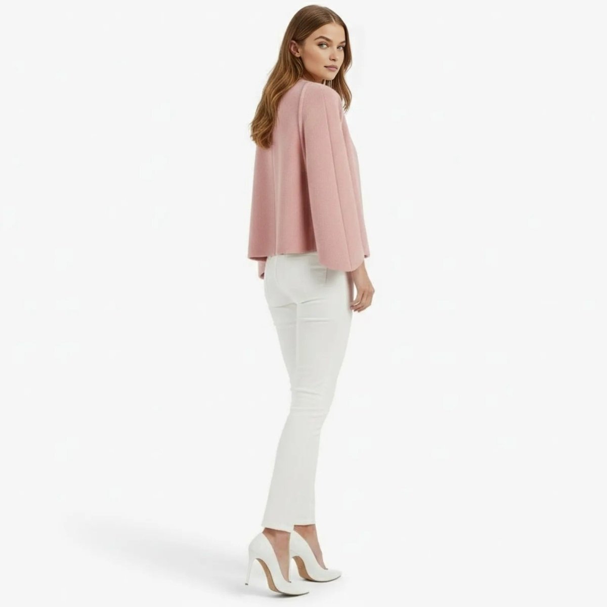 Back view of the Kouvr Fashion Laverne open-front jacket in pink, highlighting the clean lines and modern cut.
