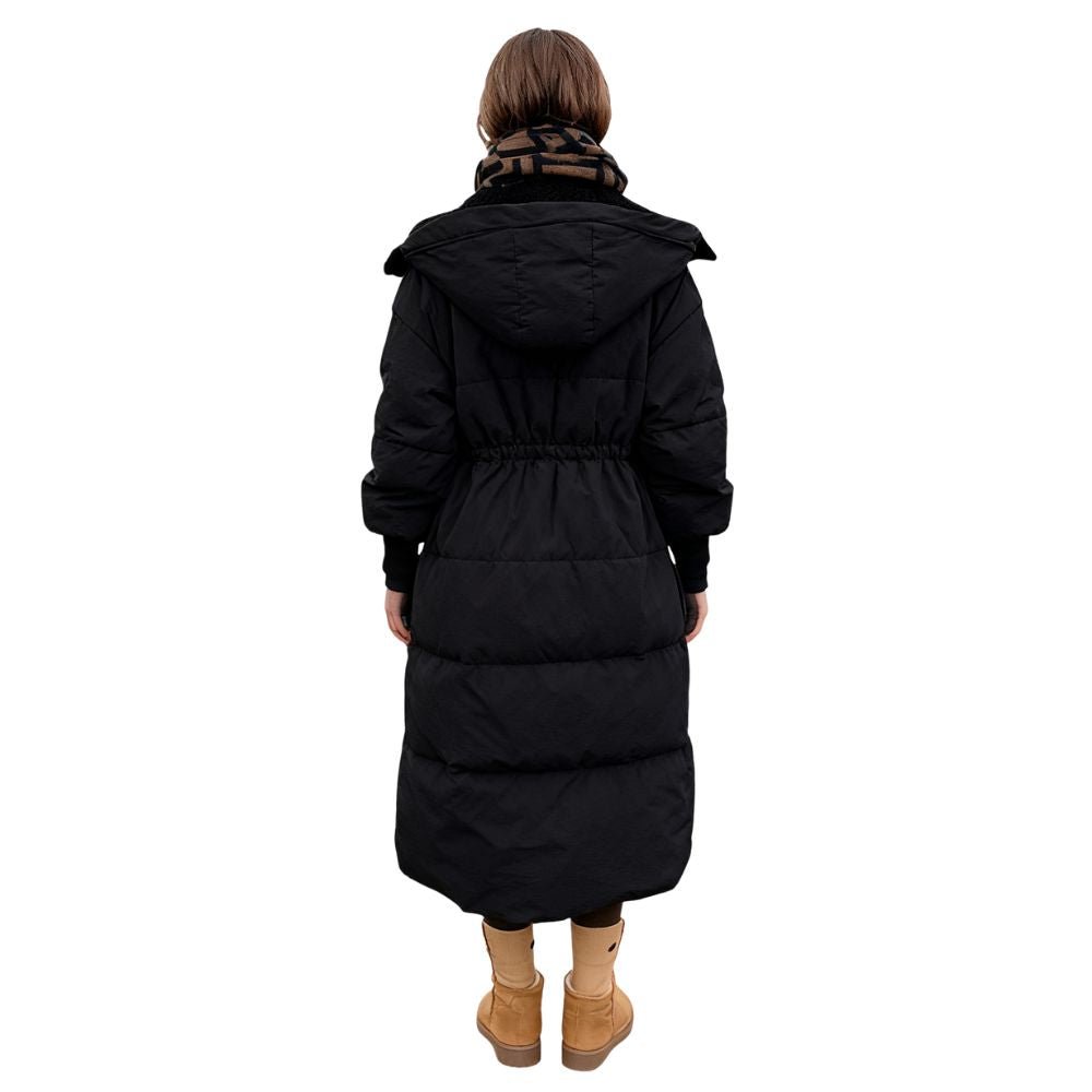 Model wearing the women's long black hooded down puffer coat