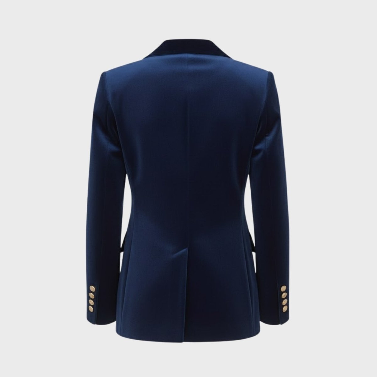 Product shot of the back of the Kouvr Fashion Maribel blue velvet blazer, detailing the tailored seams and gold cuff buttons.