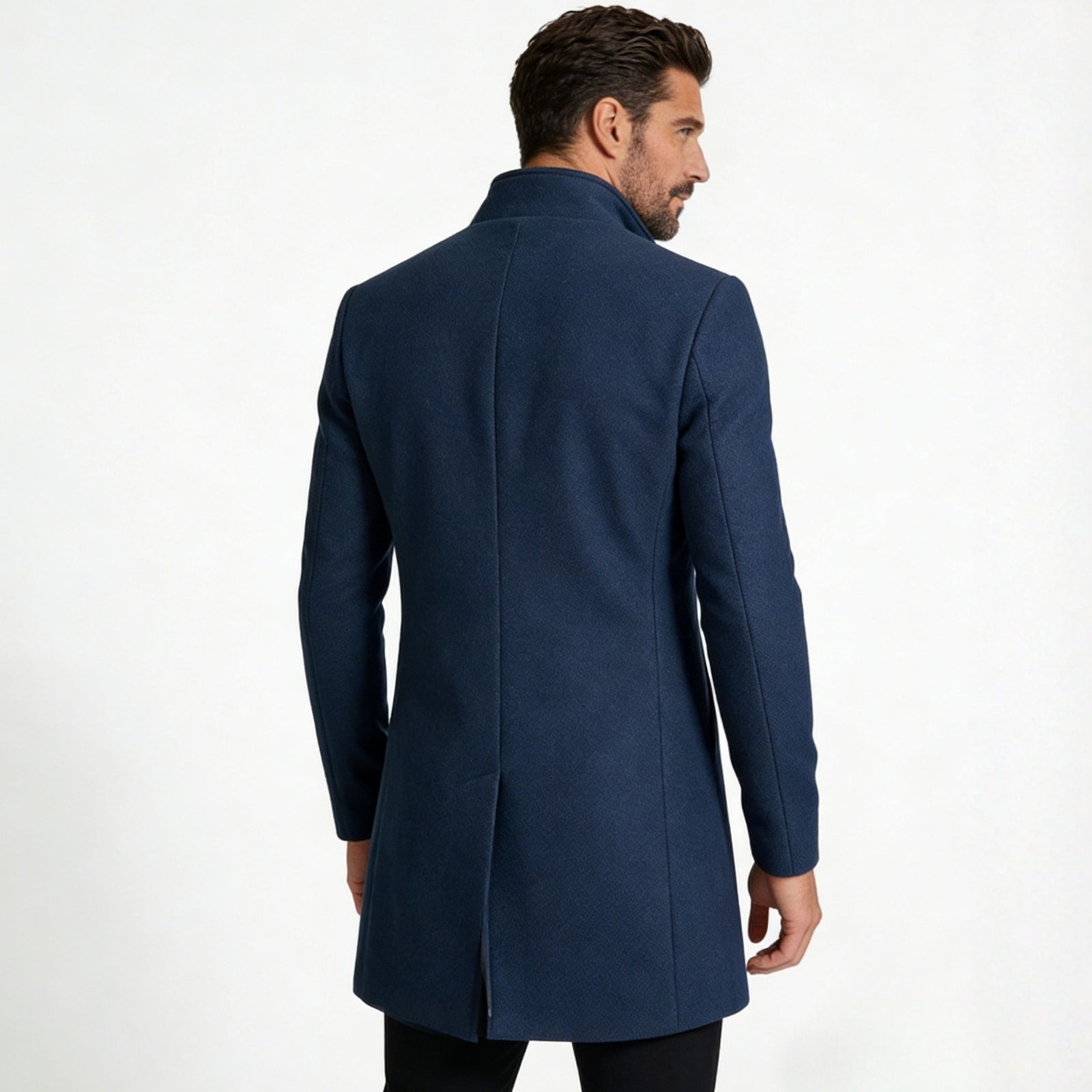 Back view of the Kouvr Fashion men's blue wool overcoat showing the clean tailoring and single center vent.