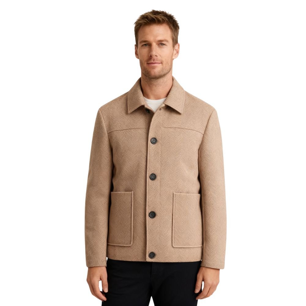 A man wearing the Kouvr Fashion khaki herringbone wool jacket over a white turtleneck, showcasing a smart casual look