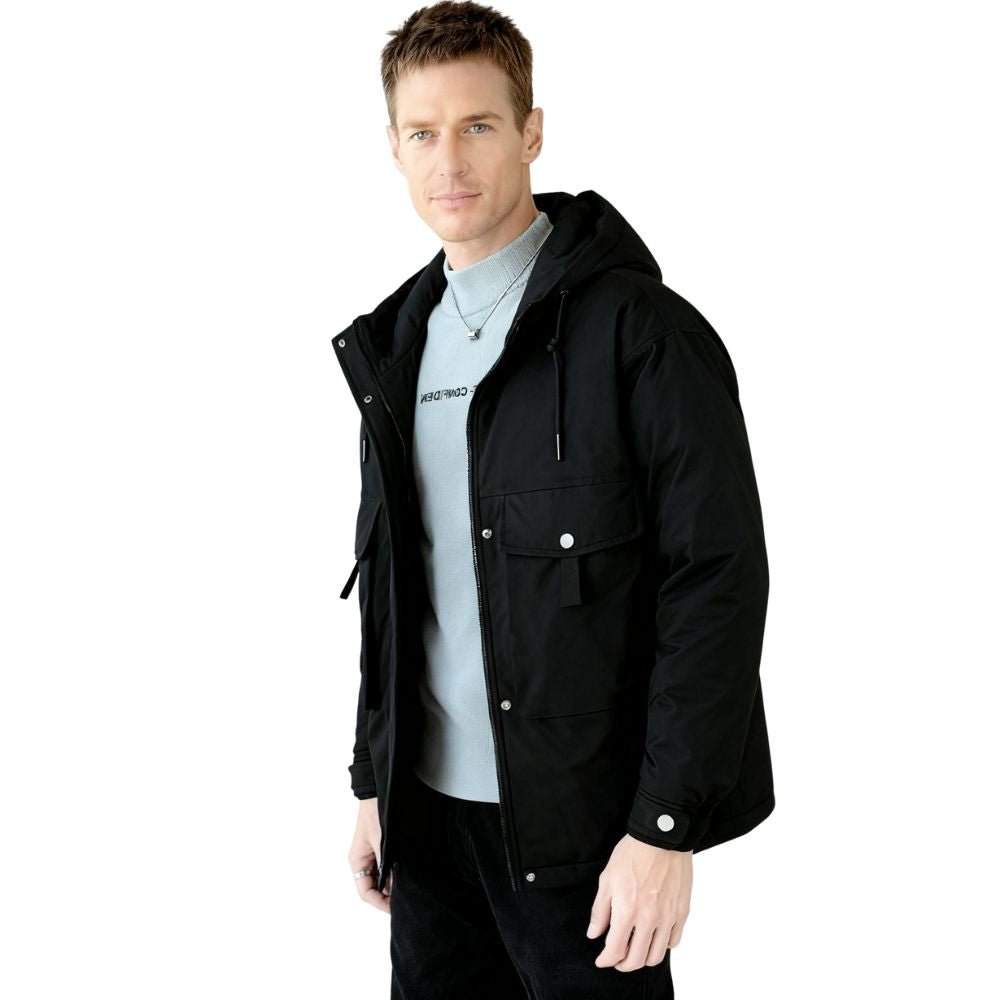 Model wearing the Kouvr Fashion Men's Urban Cade Parka in black, a luxury insulated and water-resistant winter coat
