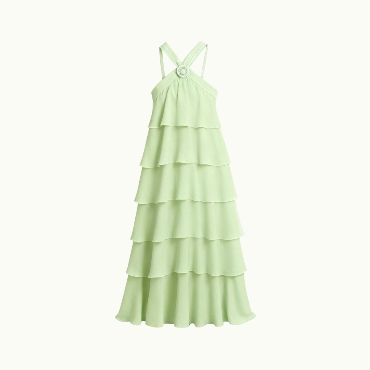Light green Kouvr tiered dress on a white background