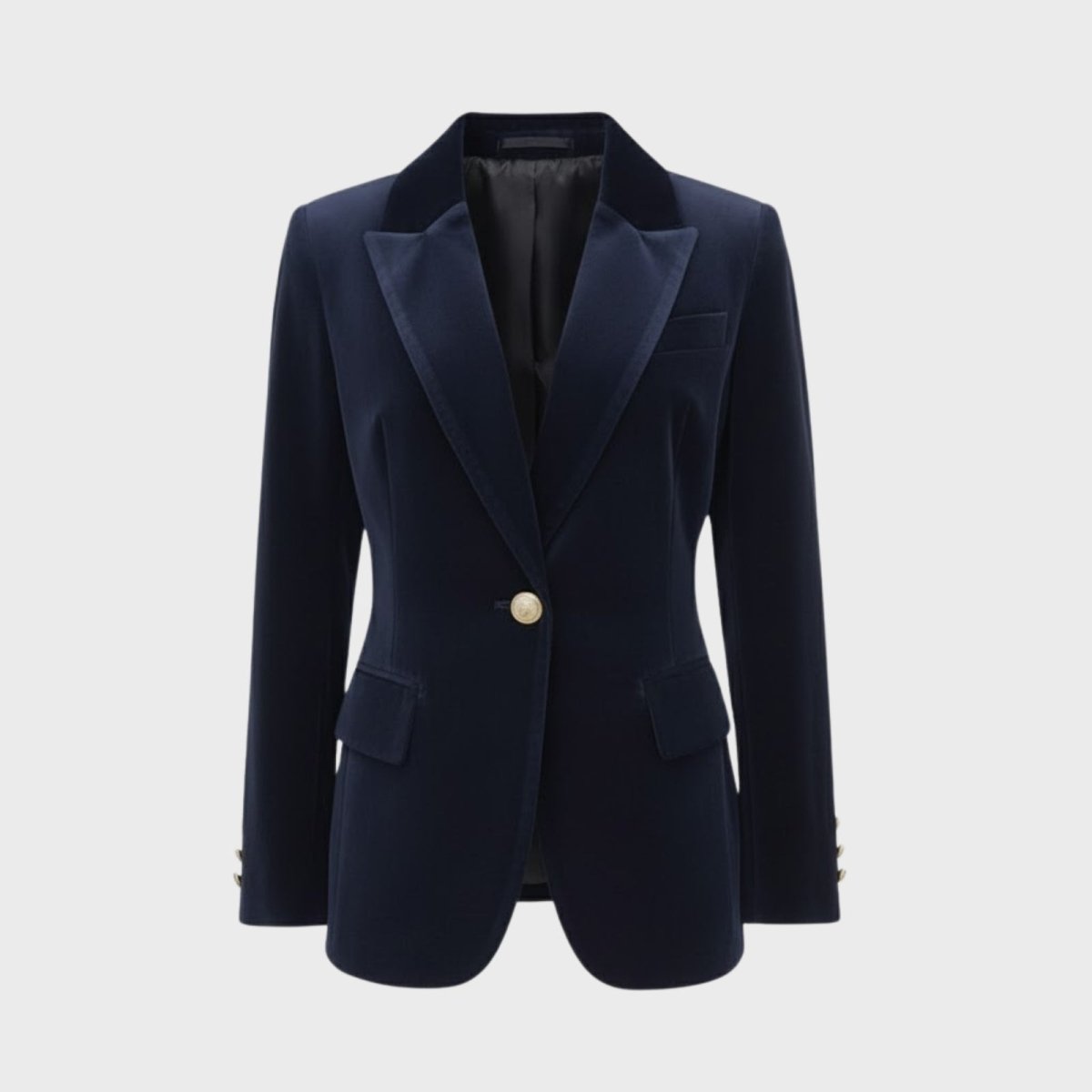 Flat lay image of the Kouvr Fashion navy blue velvet blazer, showing the satin lapel, gold button, and plush texture.
