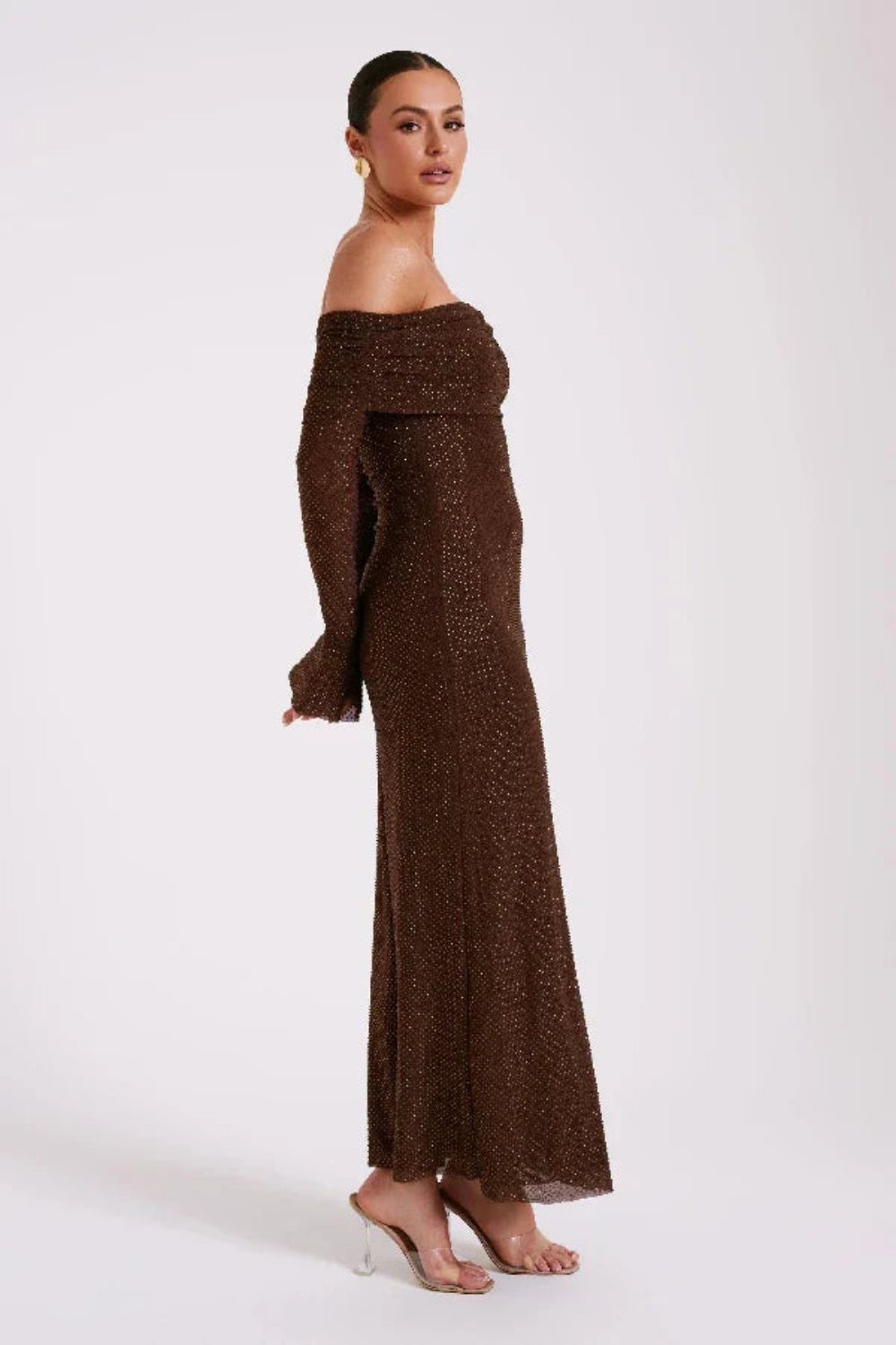 Model wearing Kouvr Fashion long sleeve off-the-shoulder brown sequin formal gown