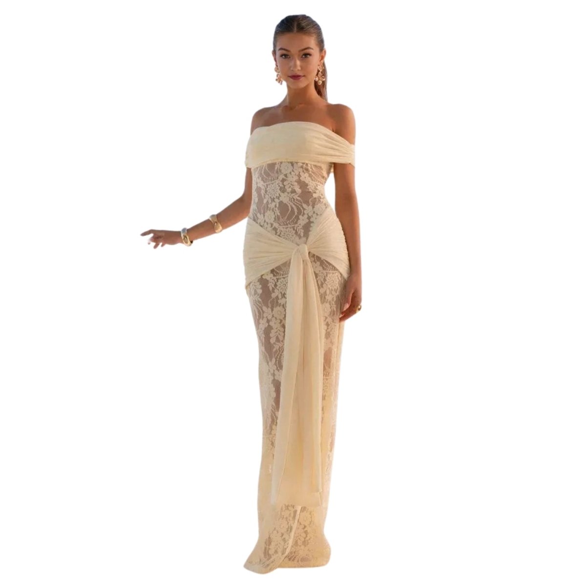 Woman wearing a beige yellow Kouvr off-shoulder gown with lace detailing on a white background