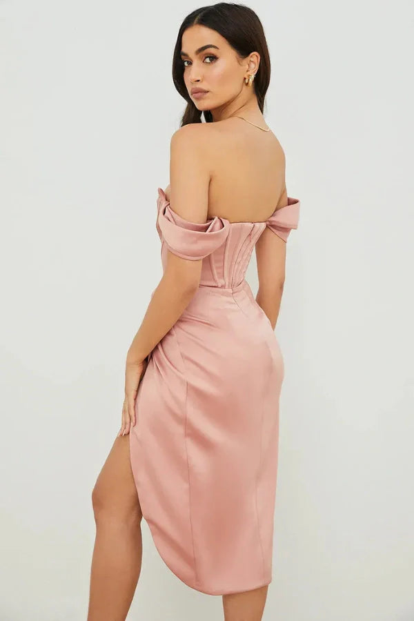 Bardot neckline, structured bodice, boning detail, asymmetrical draped skirt, thigh-high slit, and "Duchess satin