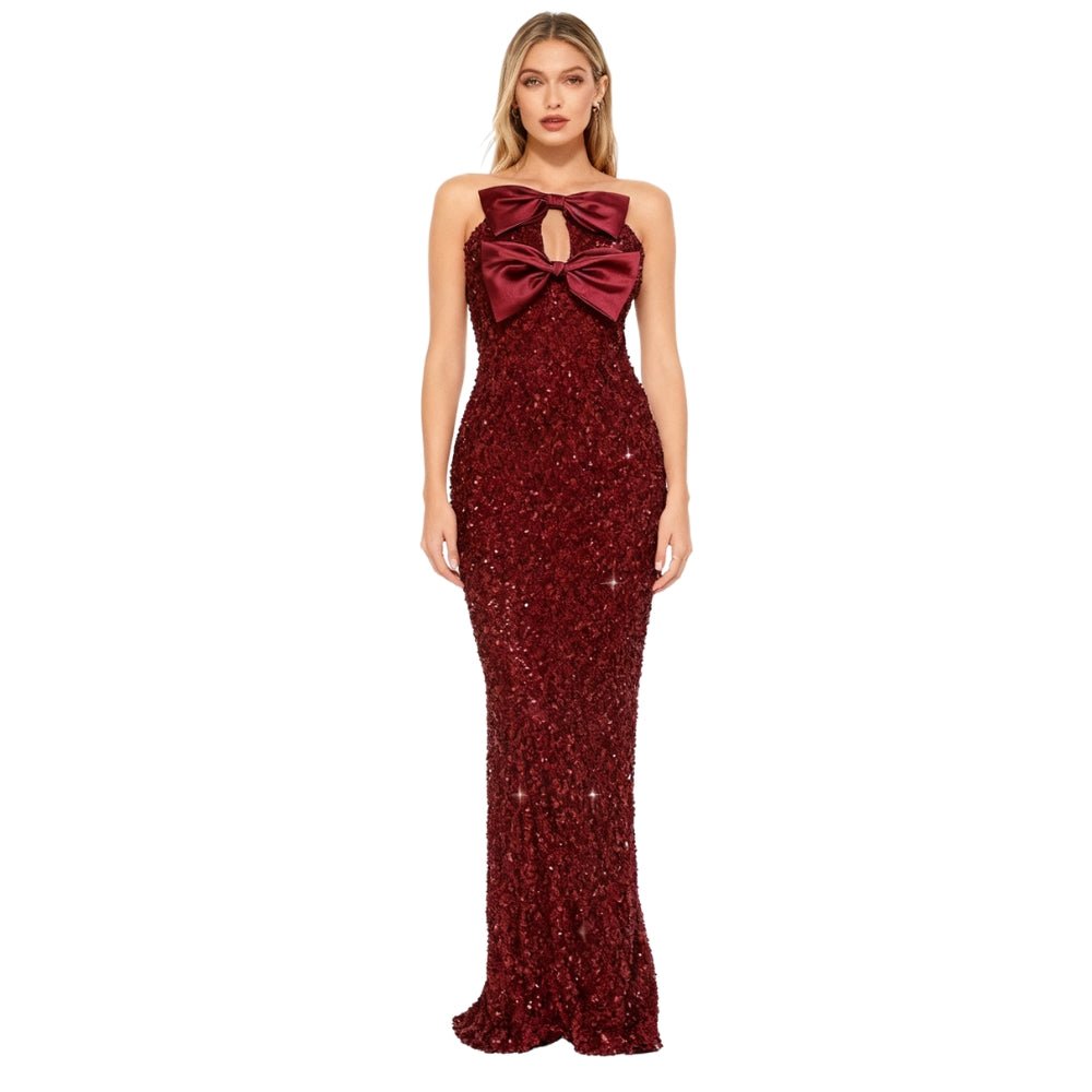 Red Kouvr sequin dress with a large bow detail on a white background