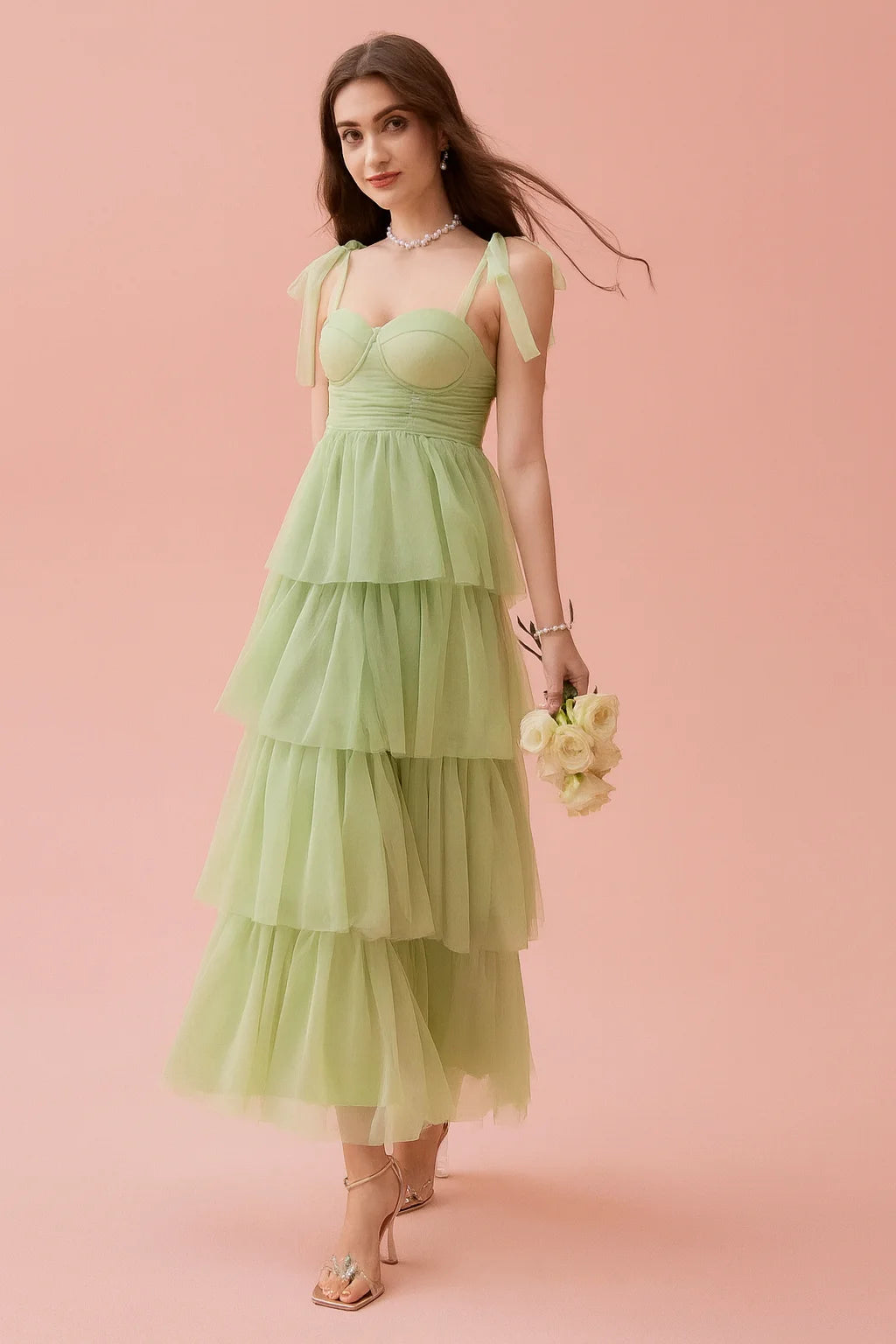 ethereal," "whimsical," "romantic," "A-line silhouette," "sweetheart neckline," "ruched," "cascading layers," "garden party," "special occasion