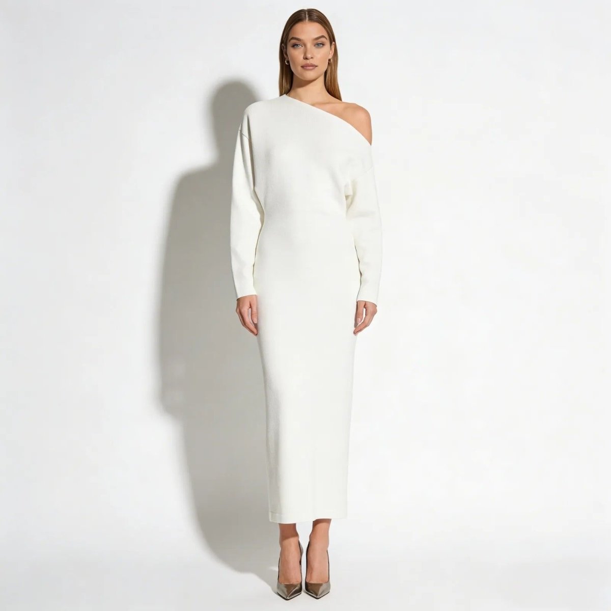 Model wearing the Kouvr Fashion Selena one-shoulder white knit maxi dress, front view against a white background.