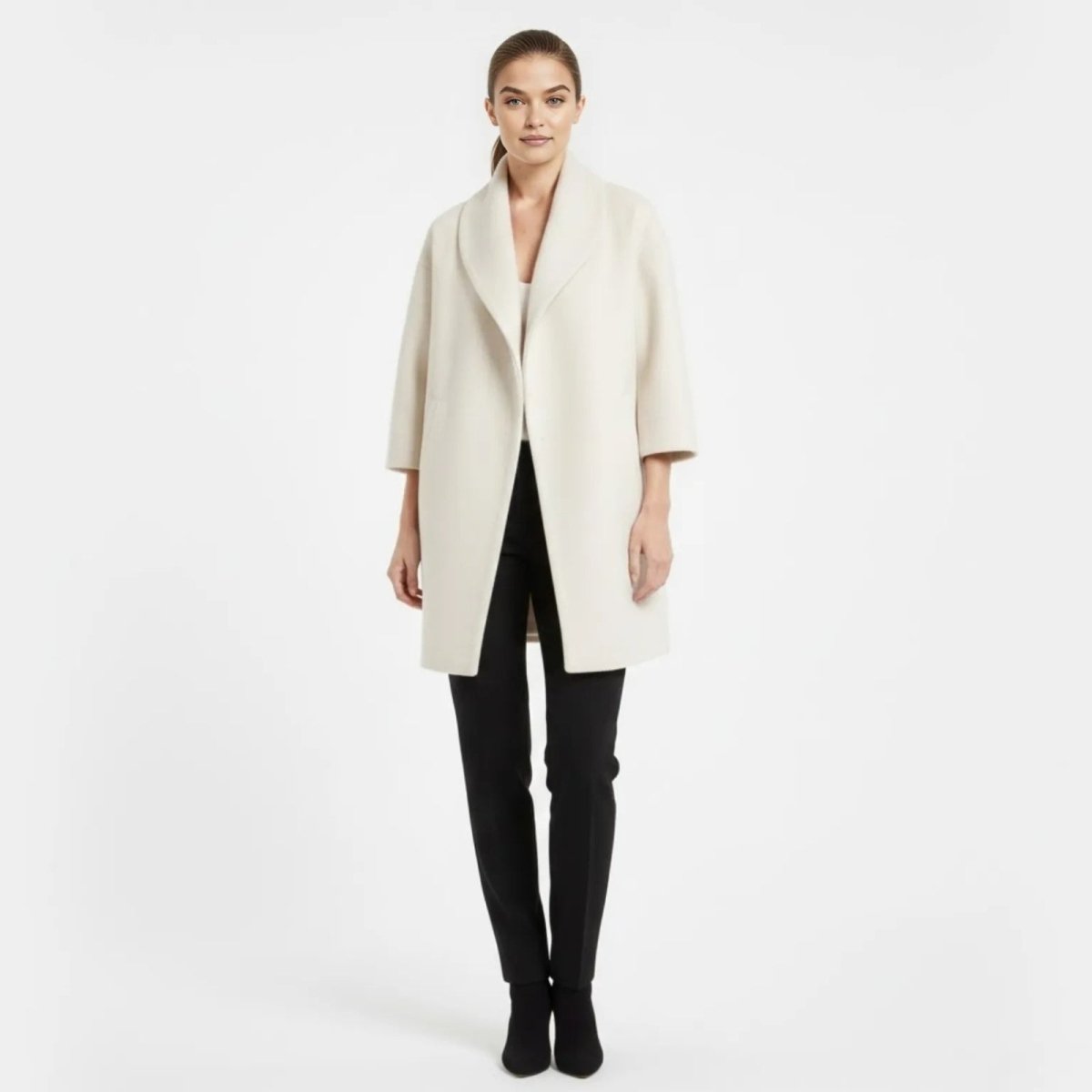 Model wearing the Kouvr Fashion white Shawl Collar Wool Blend Coat with black pants, front view.