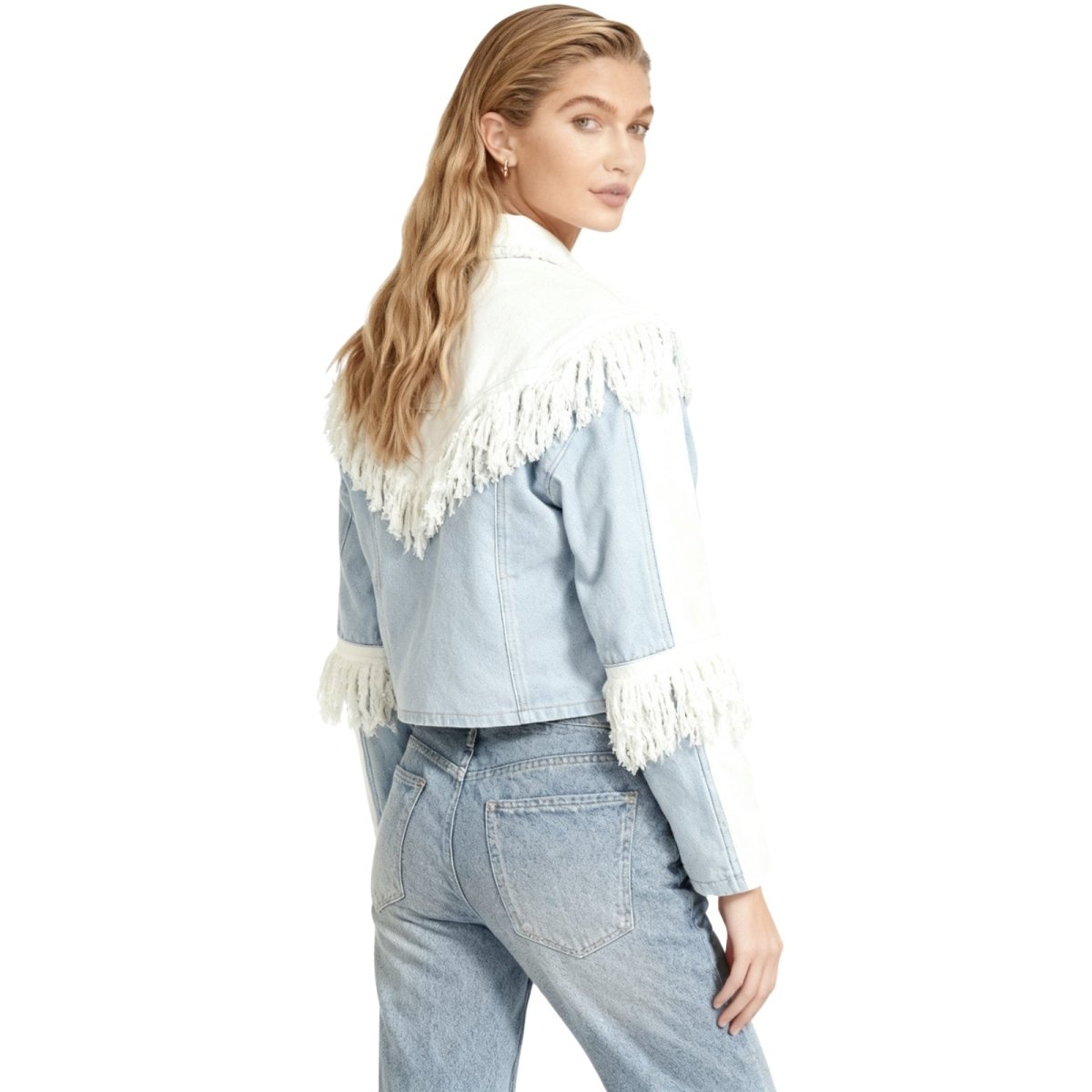 Model wearing the Kouvr Simone two-tone blue and white fringe denim jacket, front view.