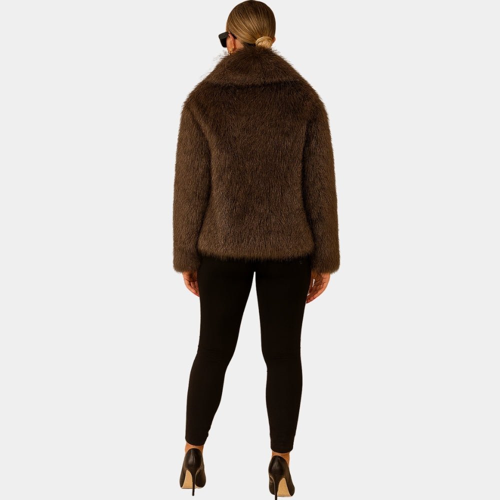 cruelty-free outerwear," "plush texture," "statement coat," "fall/winter essential," and "investment piece