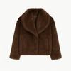 cruelty-free outerwear," "plush texture," "statement coat," "fall/winter essential," and "investment piece