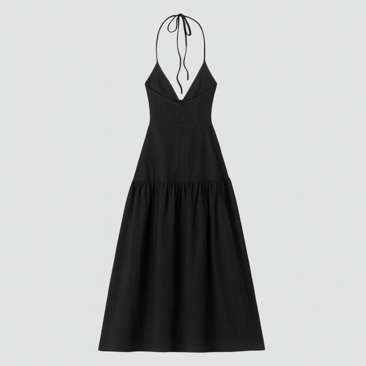 Black halter neck dress on a light gray background