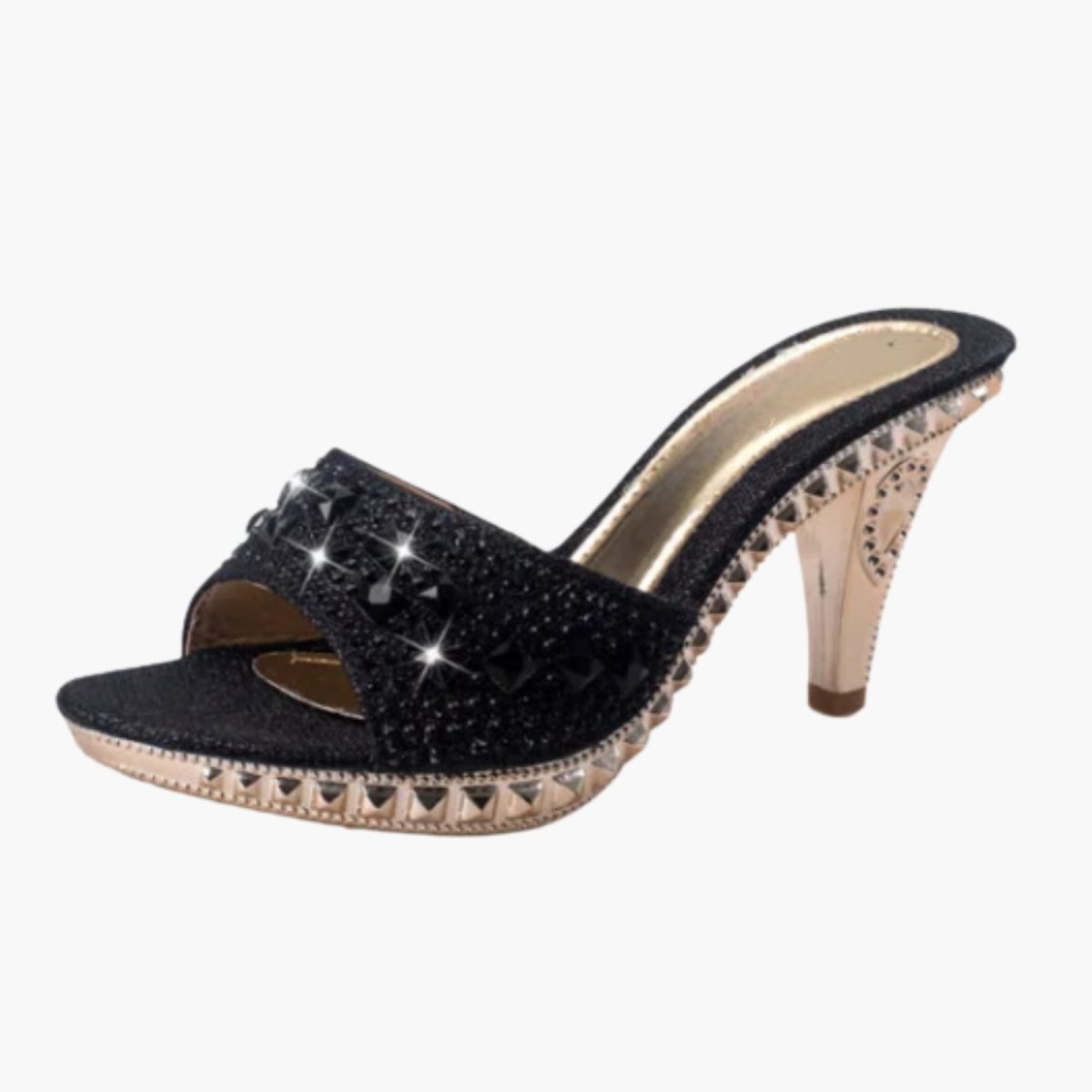 Side view of black crystal embellished platform mule high heels with a contrasting gold sculptural heel on a white background.