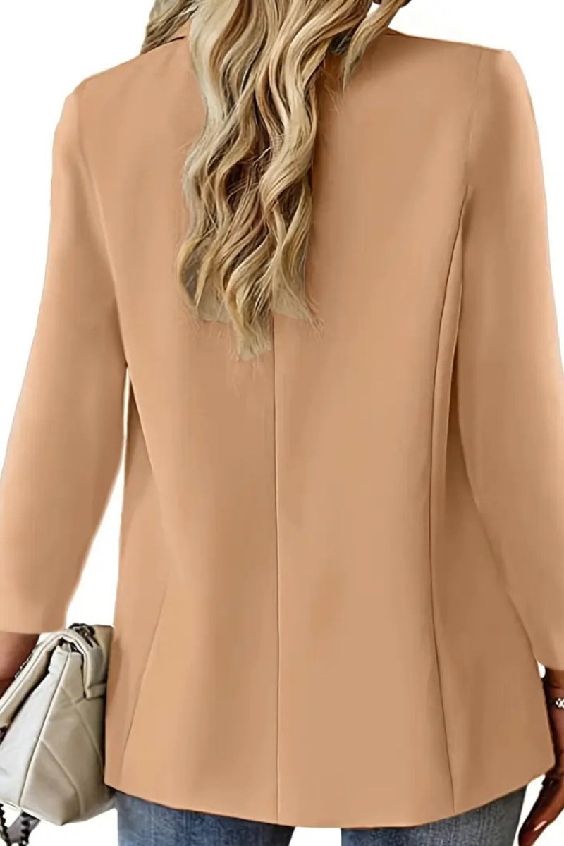Sophisticated, professional outerwear, capsule wardrobe essential, timeless jacket, versatile layering piece, structured silhouette, investment piece