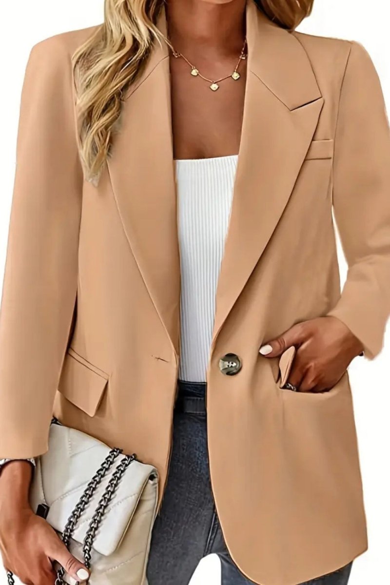 Sophisticated, professional outerwear, capsule wardrobe essential, timeless jacket, versatile layering piece, structured silhouette, investment piece