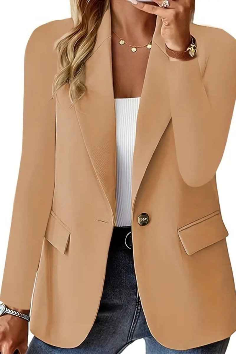 Sophisticated, professional outerwear, capsule wardrobe essential, timeless jacket, versatile layering piece, structured silhouette, investment piece