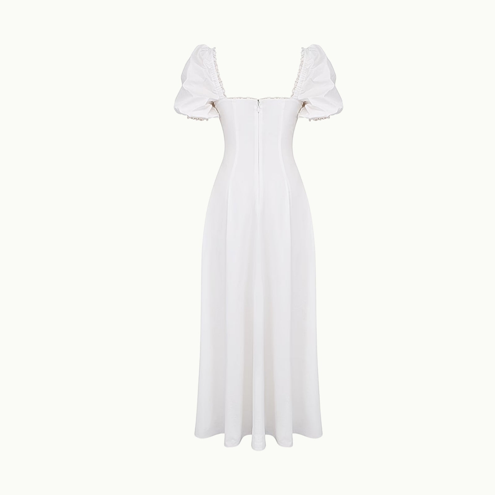 White off-shoulder dress on a white background