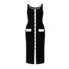Kouvr Fashion Fiorella Knit Midi Dress in black worn by a model on a city street