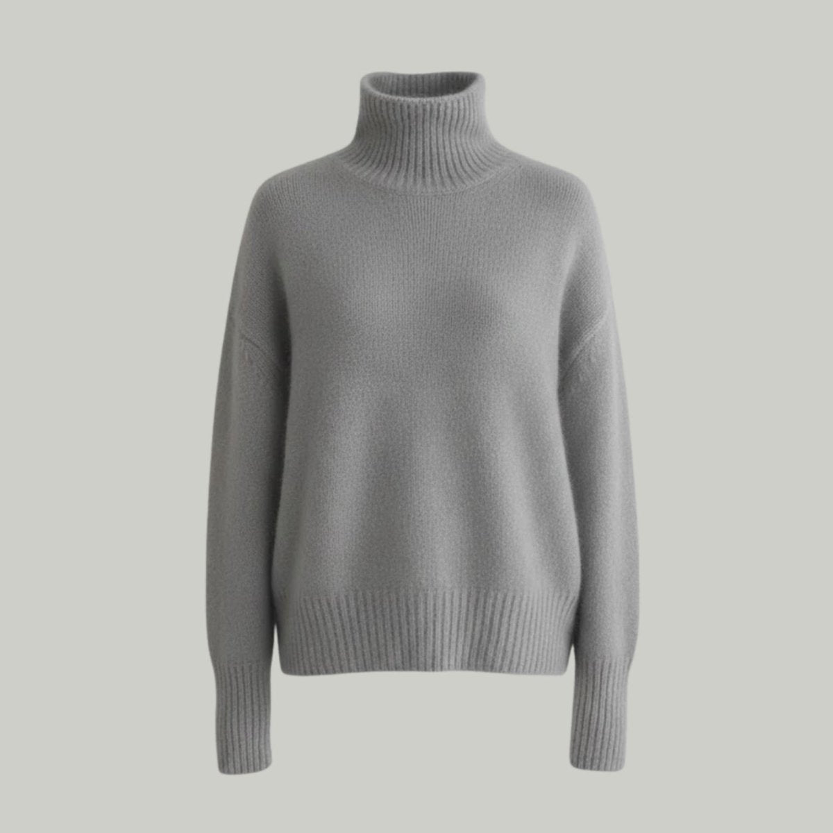 Product-only shot of the Kouvr Fashion oversized cashmere turtleneck sweater in heather grey on a light background.