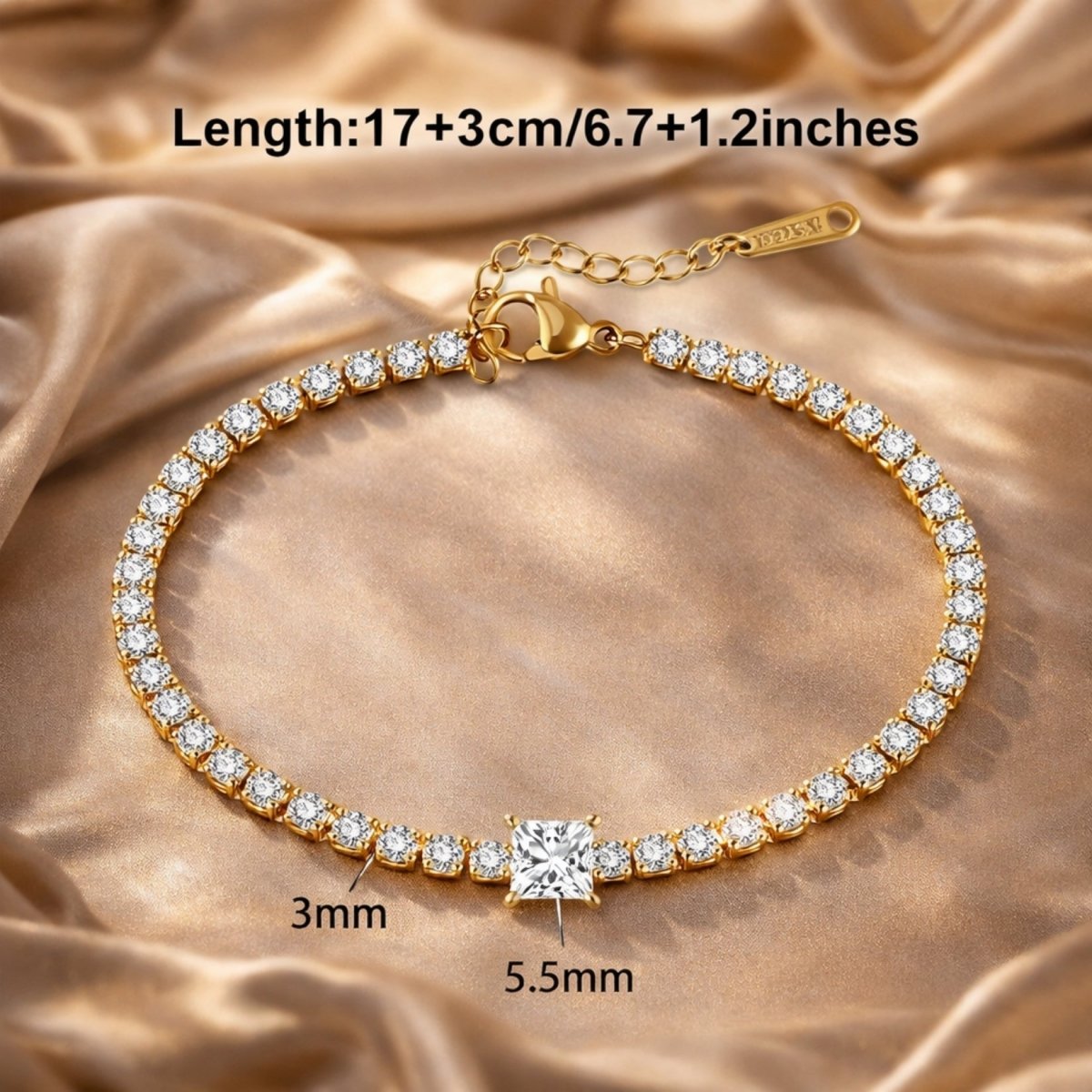 Gold tennis bracelet on a silk background with text overlays indicating its dimensions: Length 17+3cm, center stone 5.5mm, and band stones 3mm.