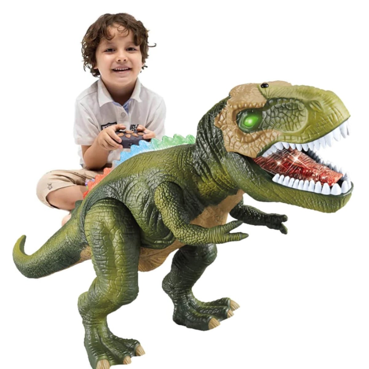 A smiling child operates the remote for a large green Kouvr T-Rex dinosaur toy with a light-up mouth and eyes.