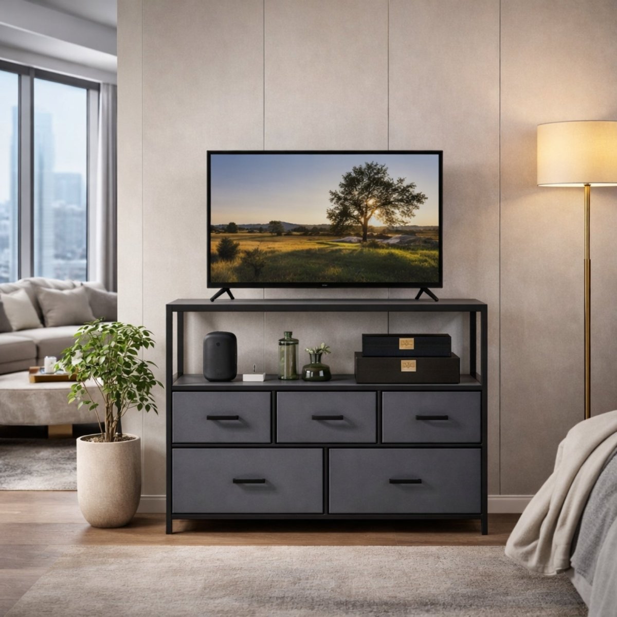 A flat-screen TV placed on the Kouvr grey media console with 5 drawers in a minimalist living room, demonstrating its use as an entertainment center.