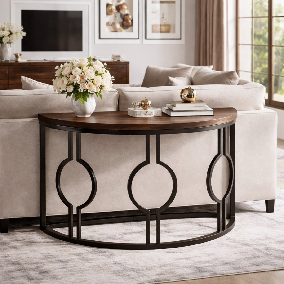Kouvr half moon console table styled behind a beige sofa featuring a dark wood top and geometric interlocking circle metal legs.
 